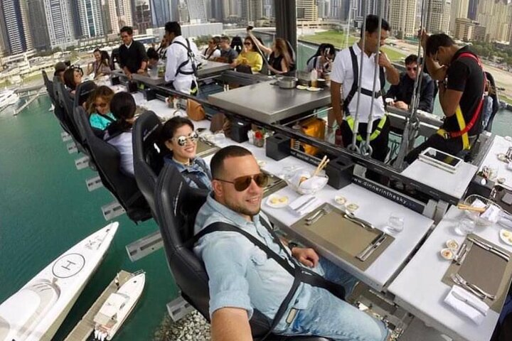 Savor a gourmet meal 50 meters above Dubai surrounded by stunning skyline views and the thrill of dining in the sky. A unique blend of culinary and scenic delight awaits.